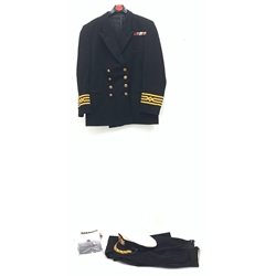 Merchant Navy captain's uniform with WW2 medal ribbons and peaked cap, epaulettes, spare cuff braiding, quantity of buttons and metal badges and two books of maritime interest