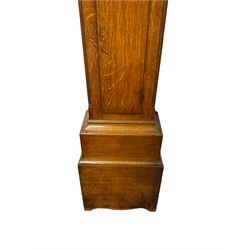 George Clapham of Brigg - Late 18th century 8-day oak cased longcase clock c1790 - flat topped hood with later carved addition, dog tooth moulding and blind fretwork beneath, break arch hood door flanked by reeded pilasters and capitals, trunk with canted corners and  door with a triple arched top, plinth with a later base with decoratively shaped feet, early painted dial with flowers enclosed in a gesso border to the spandrels, rolling moon to the arch, seconds dial and calendar aperture, Roman numerals and five minute Arabic's with makers name (indistinct), dial pinned via a false plate to a rack striking movement. With weights, key and pendulum.