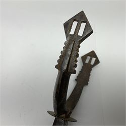 Pair of South American gaucho steel and brass spurs with twenty-two spike heel rowels, possibly Chilean L23cm