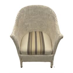 Painted wicker chair with upholstered seat cushion
