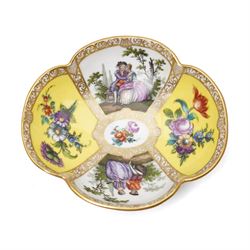 Two 19th century Dresden quatrefoil twin handled chocolate cups and saucers, decorated with Watteau style panels, with pink and yellow floral ground and gilt heightened decoration, blue 'AR' mark to underside for Helena Wolfsohn (2)