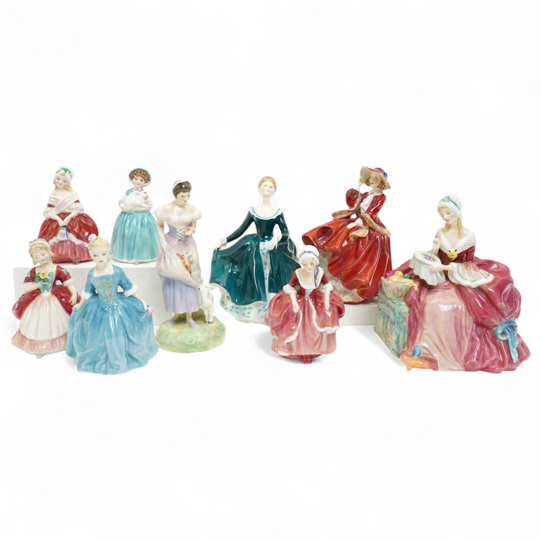 Collection of nine Royal Doulton figures, comprising 'Top o' The Hill' HN1834, 'Goody Two Shoes' HN2037, 'A Child From Williamsburg' HN2154, 'Spring' HN1885, 'Valerie' HN2107, 'Janine' HN2461, 'Bunny' HN2214, 'Peggy' HN2038 and 'Penelope' HN1901 (9)