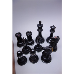  Victorian Jaques and Son London Staunton pattern weighted boxwood and ebony chess set, King H11.5cm, in baize lined mahogany box with central divider and green paper label under lid, both kings stamped JAQUES LONDON, one of each colour rooks and knights also stamped with crown  