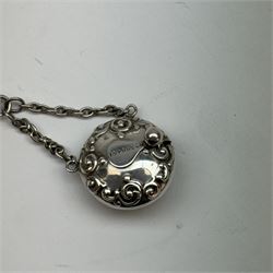 Victorian and later silver chatelaine, the shaped and foliate pierced clasp with embossed oval panel of a courting couple, hallmarked Levi & Salaman, Birmingham 1899, supporting six accessories on five chains: a circular mirror embossed with putti, hallmarked Henry Matthews, Birmingham 1911, pencil holder engraved with foliate scrolls, hallmarked Francis Webb, Birmingham 1914, conical scent bottle decorated with bamboo, (unmarked but testing as silver), aide memoire embossed with putti, hallmarked Samuel M Levi, Birmingham 1911, tape measure of compressed spherical form, hallmarked Henry Matthews, Birmingham 1899, and a purse with embossed putti, hallmarked Birmingham 1909, makers mark worn and indistinct, at longest point L31cm

