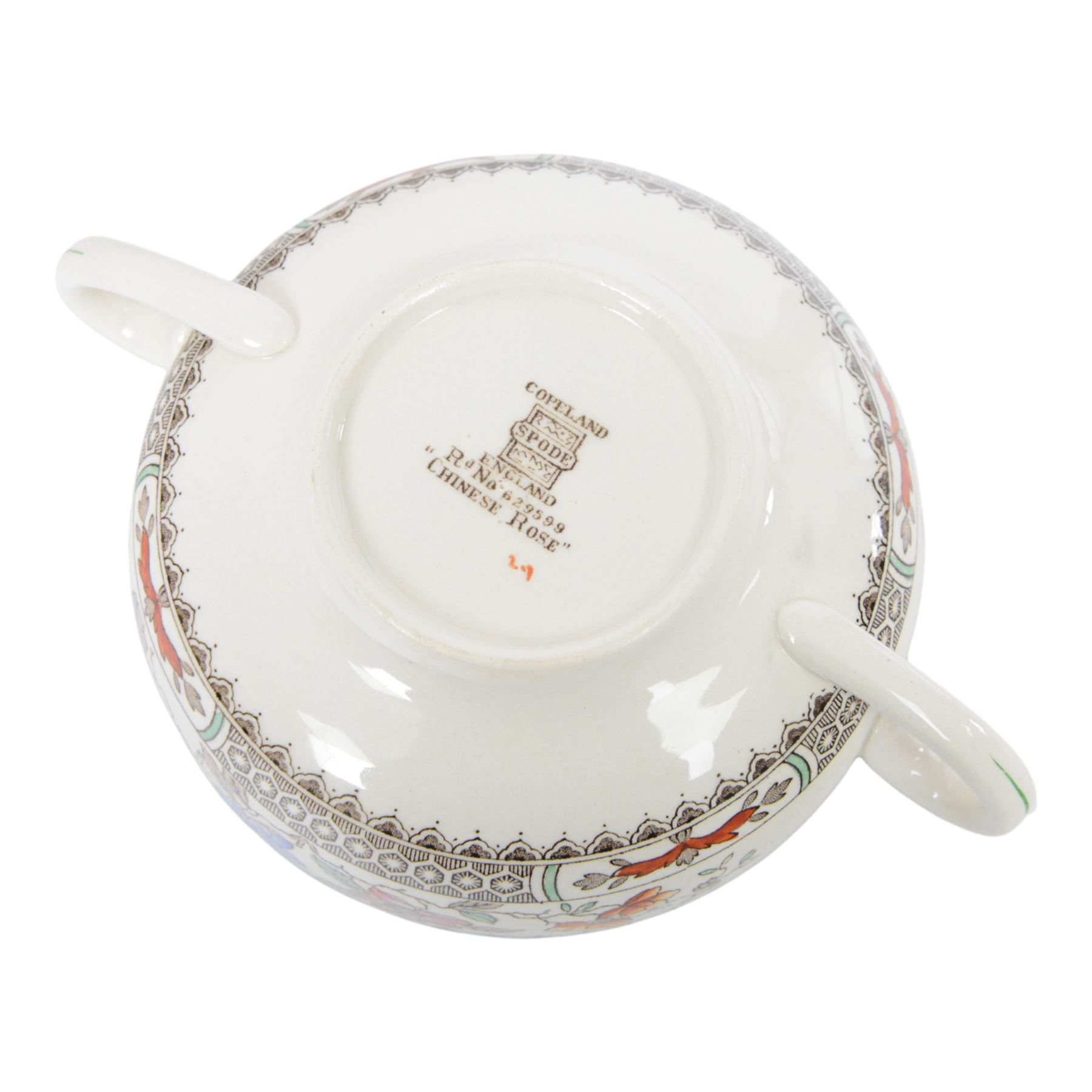 Spode Chinese Rose dinner service, including fourteen dinner plates, twelve side plates, teapot, milk jug, covered butter dish, serving platters etc 