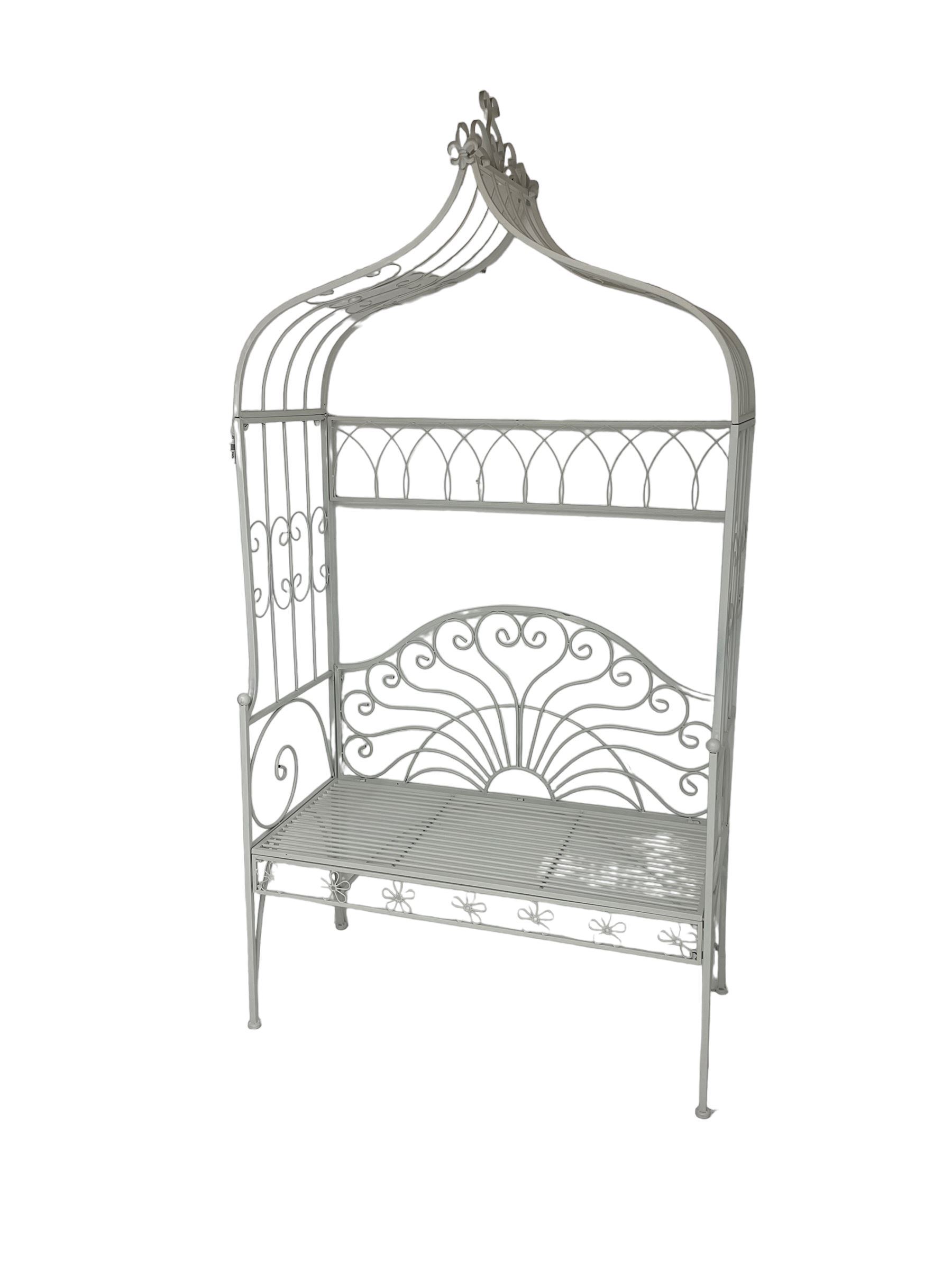 White finish wrought metal garden arbour bench, arched trellis top with scrolling design, lunette style back 