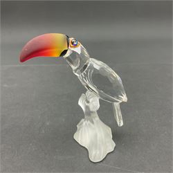 Three Swarovski Crystal bird figures, comprising Toucan, pair of puffins and pair of parrots on a branch, tallest H10cm