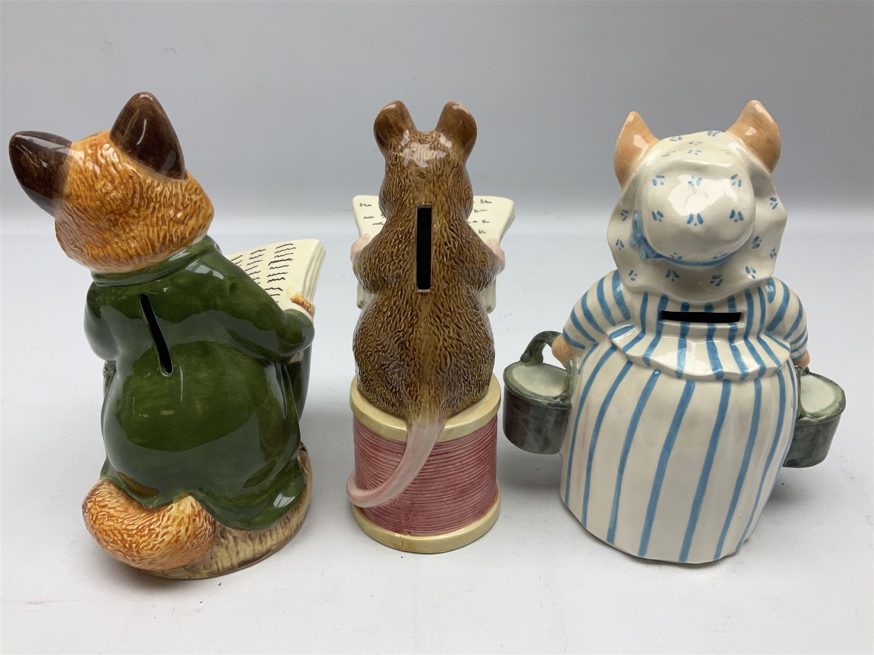 Nine Border Fine Arts and Enesco Beatrix Potter money boxes, to include Peter Rabbit, Benjamin Bunny, Mrs Tiggy-winkle, jemima puddle duck etc  