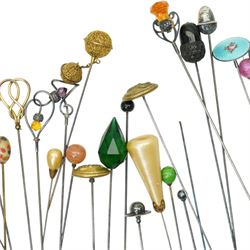 Collection of early 20th century and later hat pins including six silver mounted examples by Charles Horner, pique work, faceted class, jet acorn, filigree etc