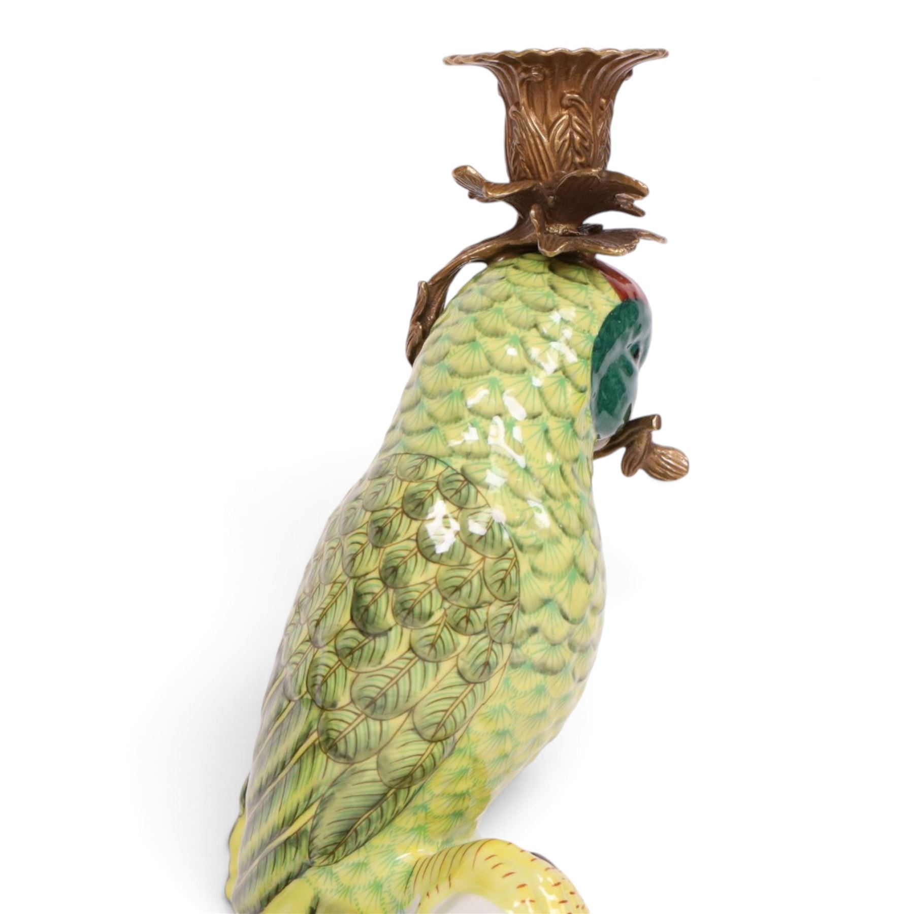 Pair of candlesticks, modelled as green parrot upon a flowering branch, upon four gilt acanthus leaf feet, H36cm