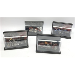 Three Franklin Mint die-cast models of Harley Davidson motorcycles comprising 1948 Panhead and Electra Glide, both boxed, and unboxed Sportster; and a Franklin Mint 1942 Indian 442, boxed; together with four ebonised and plastic display cases (8)