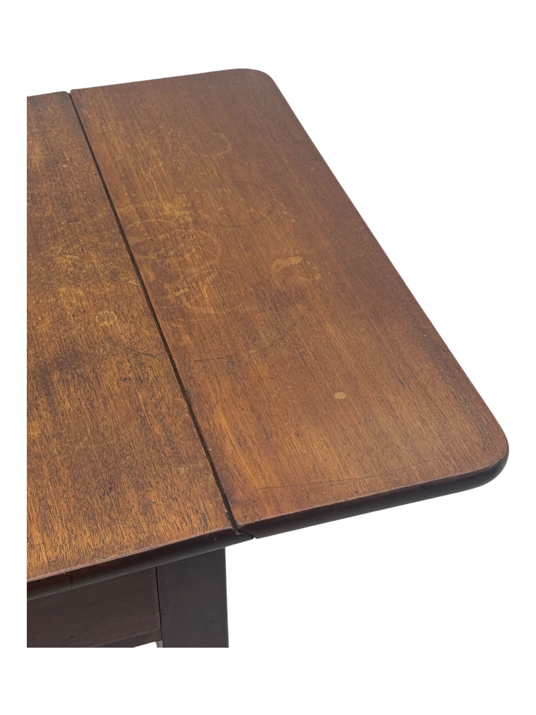 Georgian design mahogany drop-leaf table, rectangular top above a single drawer with brass handle, square supports united by arched undertier, on brass castors (W62cm, D65cm, H72cm); and a smaller mahogany drop-leaf table with single drawer on turned supports (W43cm, D61cm, H72cm)