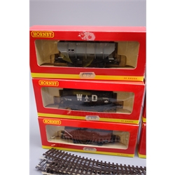  Hornby '00' gauge - nine boxed goods wagons and seven unboxed, boxed Bachmann ore wagon and small quantity of track  