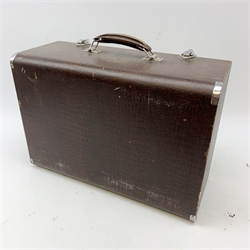 A vintage mid 20th Century cased Singer manual sewing machine, within faux crocodile carry case.