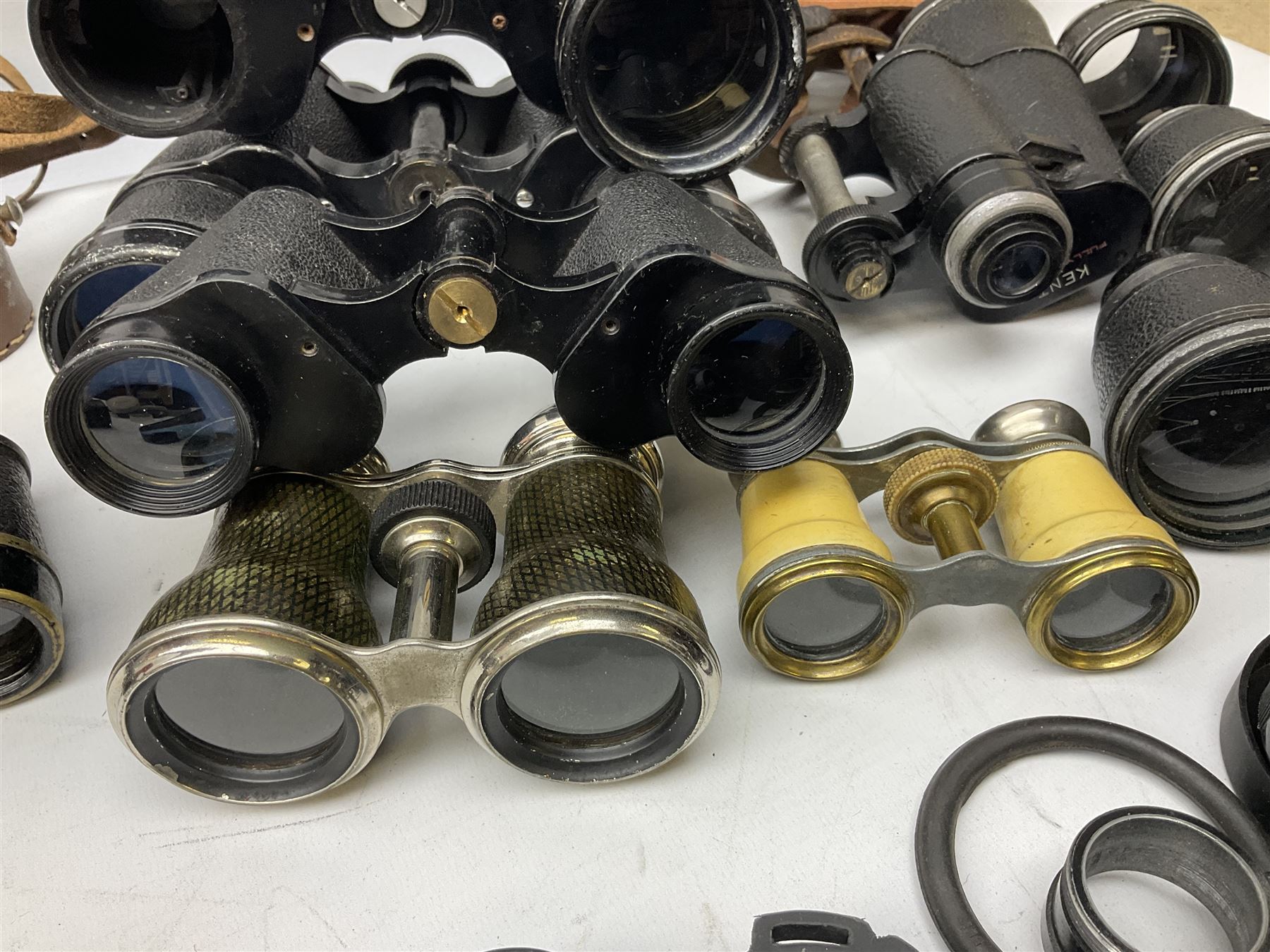 Quantity of binoculars for spares and repair, to include Cogswell & Harrison Primic 8x30, Prinz 8x30, Telstar 35x60, Zeiss Wetzland 8x40 etc