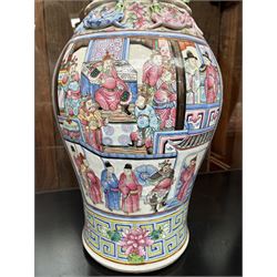 Large pair of 19th century Cantonese famille rose vases, each painted with various courtly scenes, including a display of warriors fighting on horseback before an official and his attendants, double Buddhist lion handles and applied at the shoulders with chilong, the lower band painted with Greek key motif, H58cm (2)