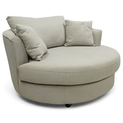 Contemporary circular snuggle chair, upholstered in taupe linen-effect fabric with fixed seat and loose back and scatter cushions, on concealed castors