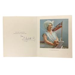 H.M. Queen Elizabeth The Queen Mother, signed 1967 Christmas card with gilt crown to cover, photograph of The Queen Mother on board HMY Britannia 'Off Newfoundland 1967' to the interior, signed 'from Elizabeth R'.