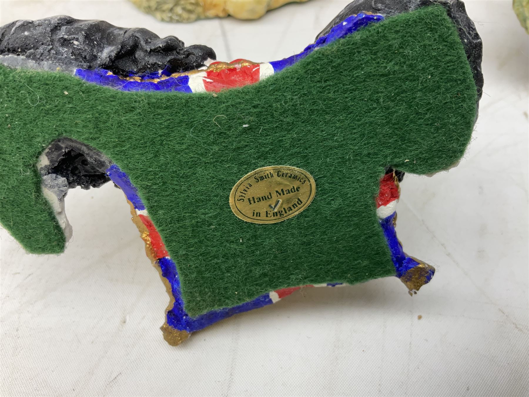 Three Sylvia Smith models of Old English Sheepdogs, Royal Orleans Pink Panther lidded box, two Crummels boxes and two Royal Worcester bird figures