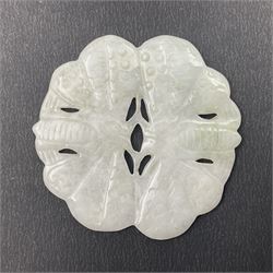 Chinese jade disc, of lobed circular form, pierced and engraved, carved in the form of two lotus, D5cm