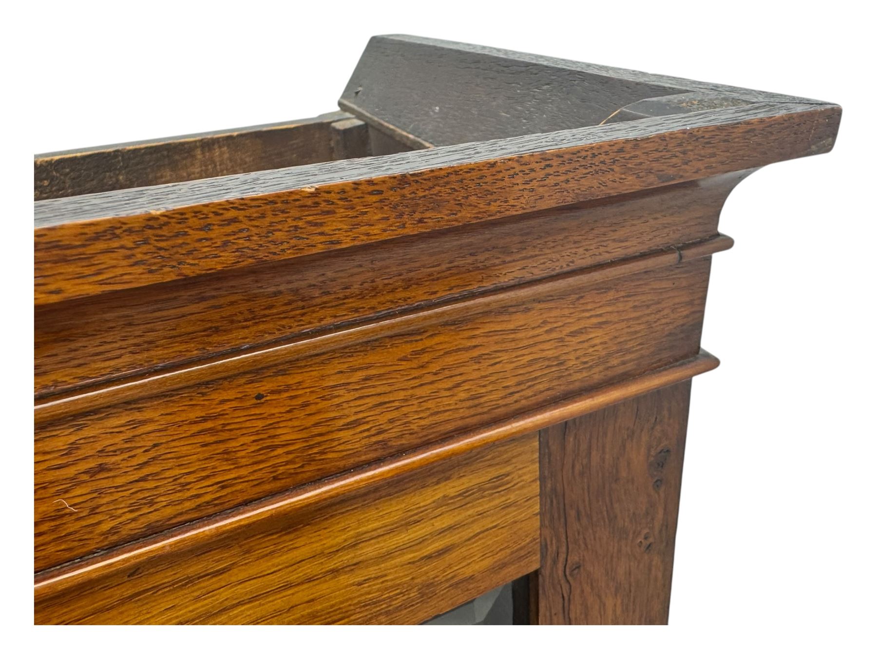 Late 19th century oak display cabinet, rectangular form with a pair of glazed doors enclosing shelves, raised on cabriole supports with carved detailing ending in claw feet
