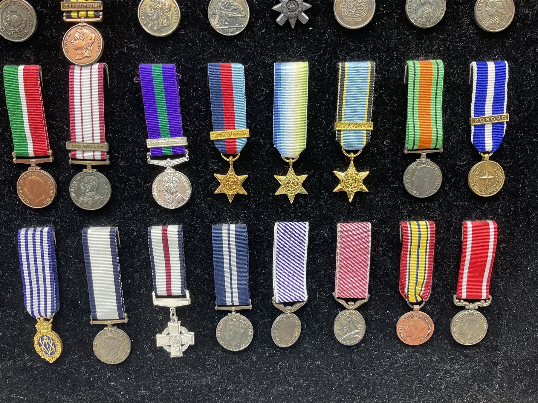 Two limited edition large framed display boards with half-size copies of British Gallantry and Campaign Medals produced by Danbury Mint and entitled 'For Valour'. Sixty medals on each board, all with ribbons. Complete with Danbury Mint certificate serial number A0148 and other paperwork.