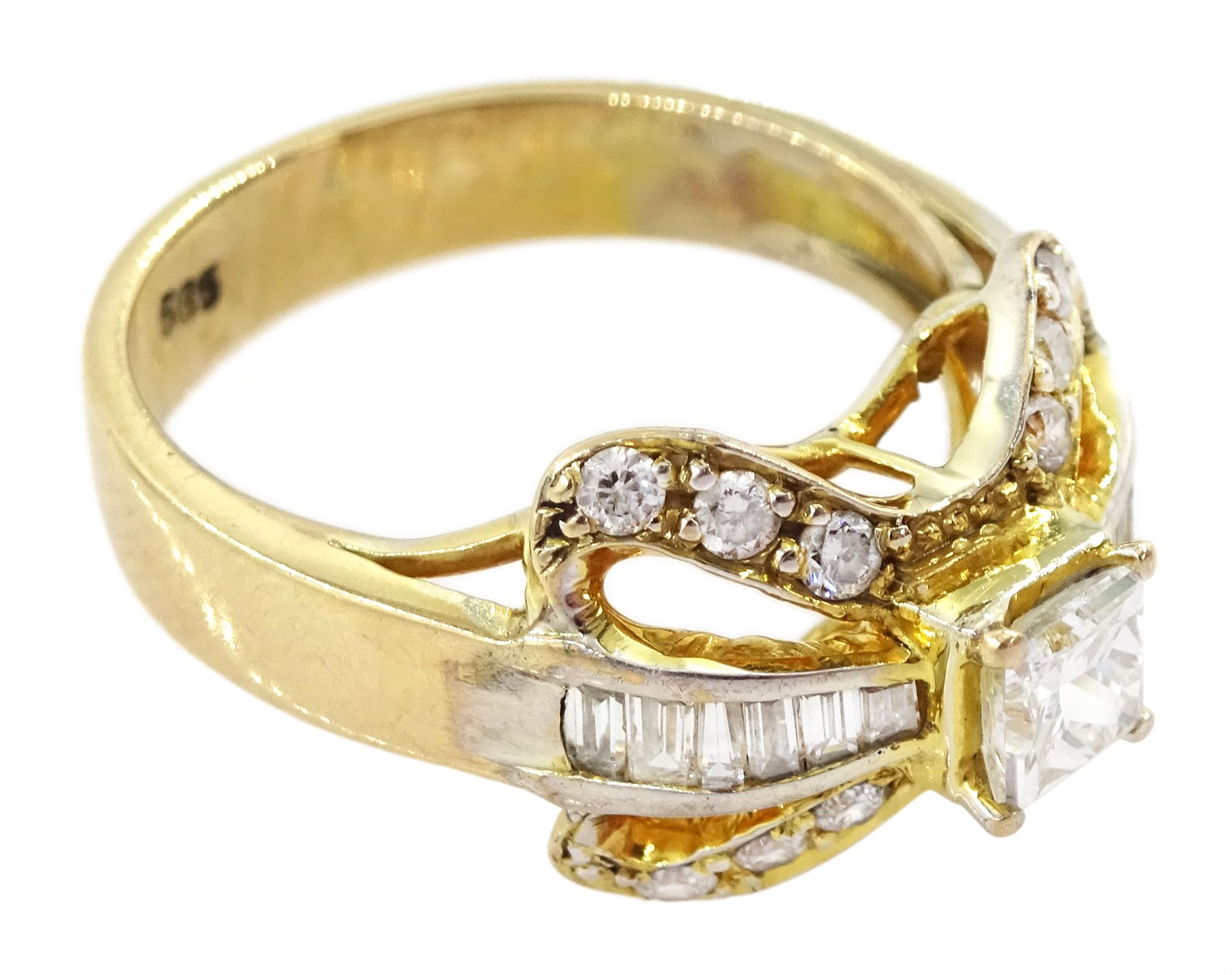 14ct gold diamond bow ring, the central princess cut diamond of approx 0.30 carat, with baguette and round brilliant cut diamond surround, stamped 585