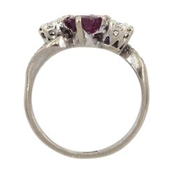 18ct white gold three stone oval ruby and round brilliant cut diamond ring, with diamond set shoulders, stamped, ruby approx 1.15 carat, total diamond weight approx 0.55 carat, in silver top ring box by The Victorian Ring Box Co, Edinburgh 1993 