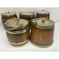 Five early 20th century biscuit barrels with silver-plated mounts