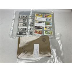 Quantity of trade cards, housed in ring binder albums and loose, including Twinnings, Lyons, PG Tips, Hornimans, Ty-Phoo etc and various unused official paper albums, in two boxes