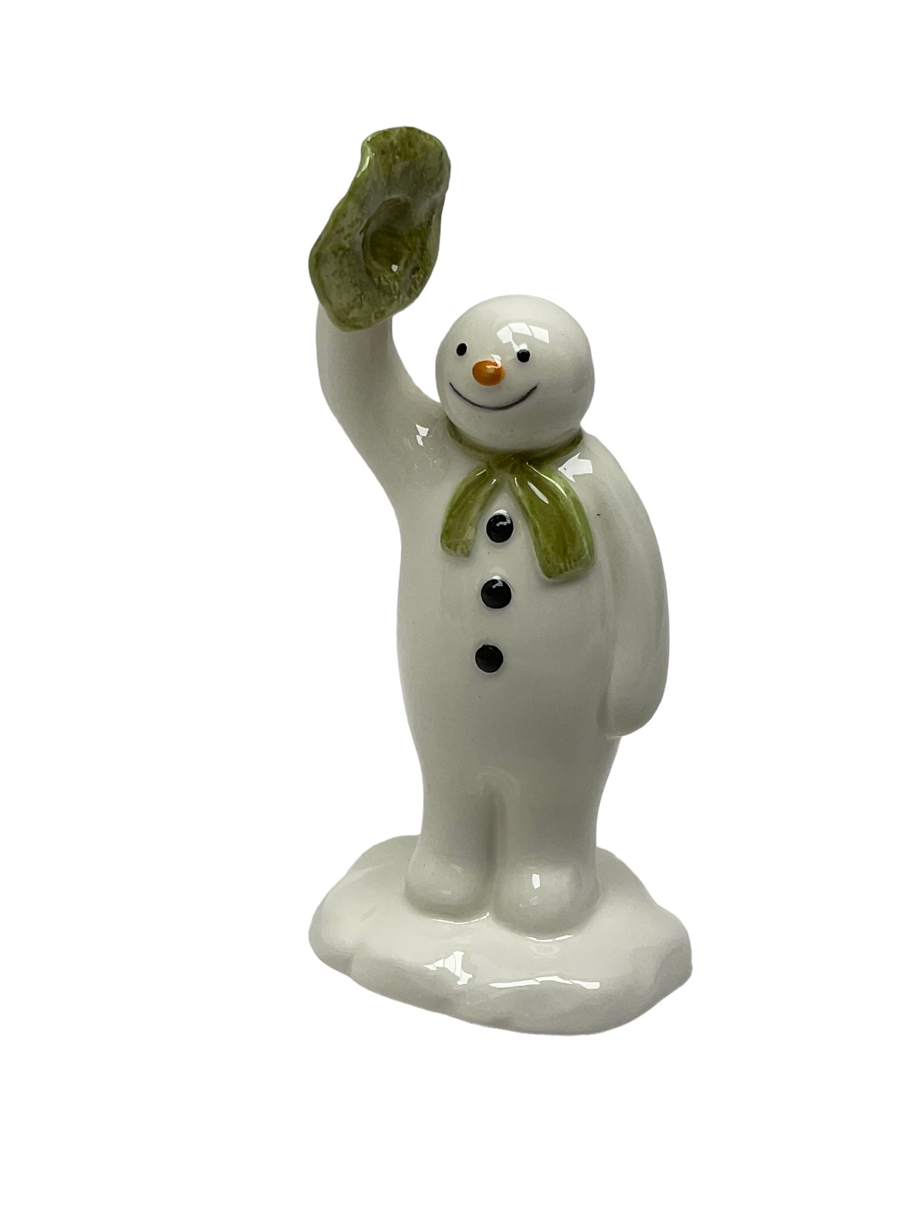 Two Beswick figures, composing The Snowman and Father Christmas, together with Border Fine Arts Enamel dish depicting a scene from The Snowman A3995, all in original boxes 