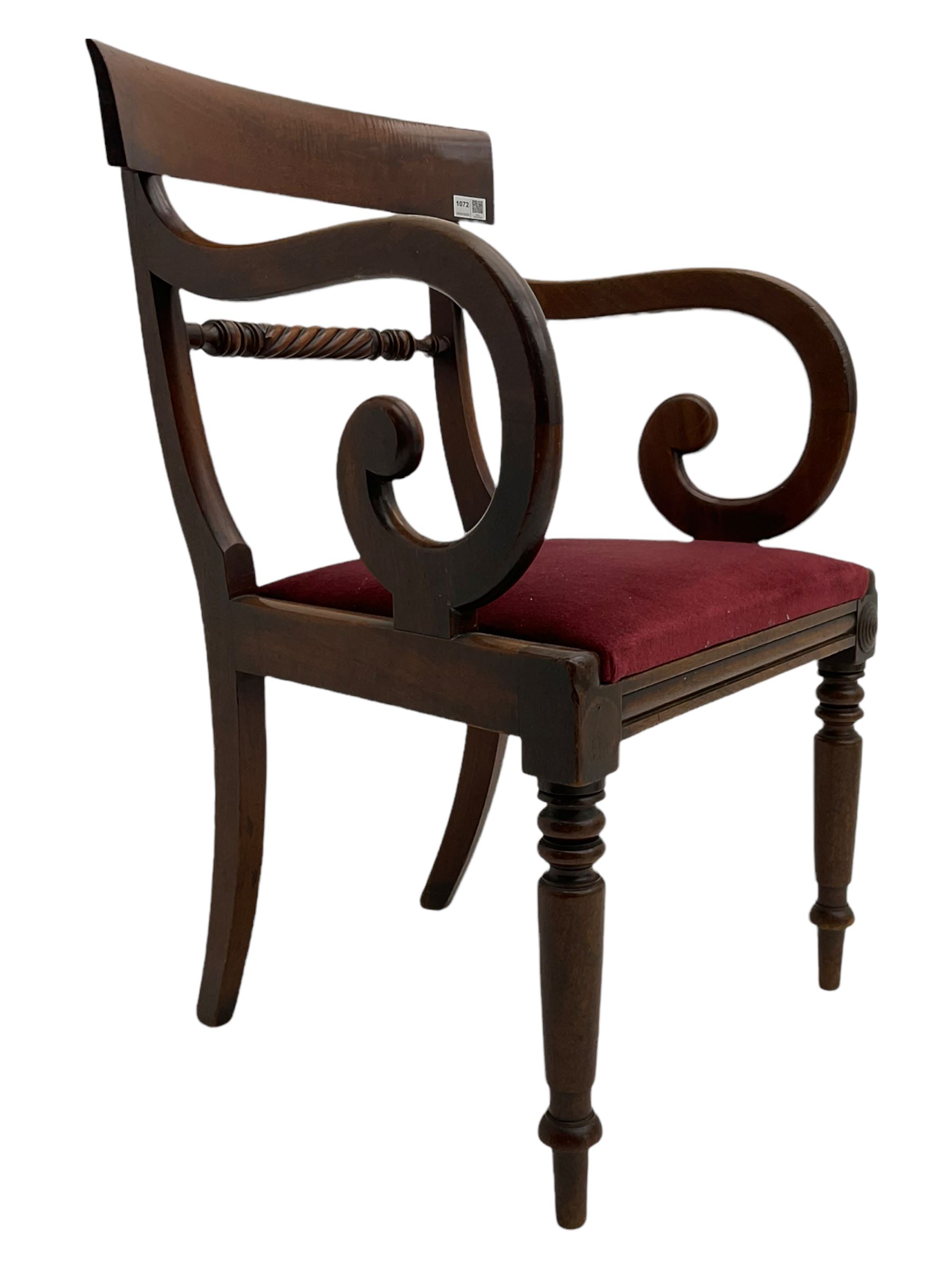Seven early 19th century mahogany dining chairs - set six side chairs with scroll carved middle rails (W46cm), and a carver elbow chair with rope twist middle rail