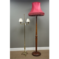  Late 20th century brass two branch lamp (H155cm), and a 20th century walnut standard lamp on turned column (H152cm)  