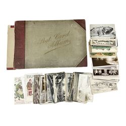 Album containing approximately four hundred Edwardian and later postcards including three Louis Wain, comic cards by Tom Browne, Phil May etc, British and Foreign topographical including real photographic and local, Coronation trams, actresses etc; and large quantity of loose postcards including WW1 Belgium views and caricatures, Royalty portraits etc, 