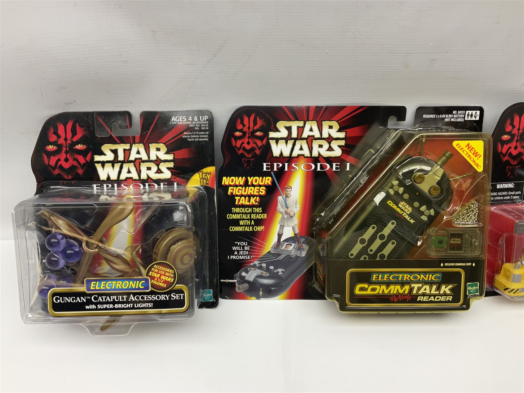 Star Wars - twenty-five 1998/1999 Star Wars Episode One figures and accessory sets by Hasbro in original card backed packaging; both Collection 1 and 2 with Electronic Commtalk reader for each figure's commtalk chip.