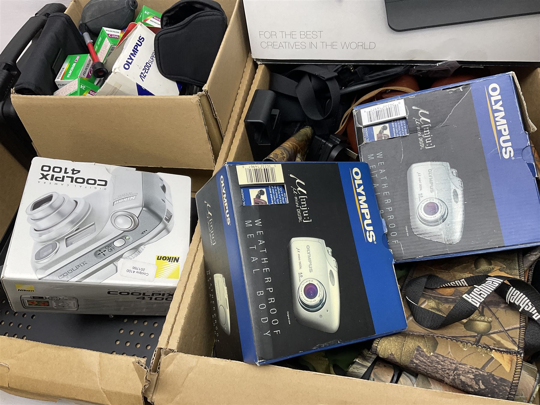 Rocwing photography studio lighting stands and shades, together with digital cameras and other camera equipment, in three boxes  