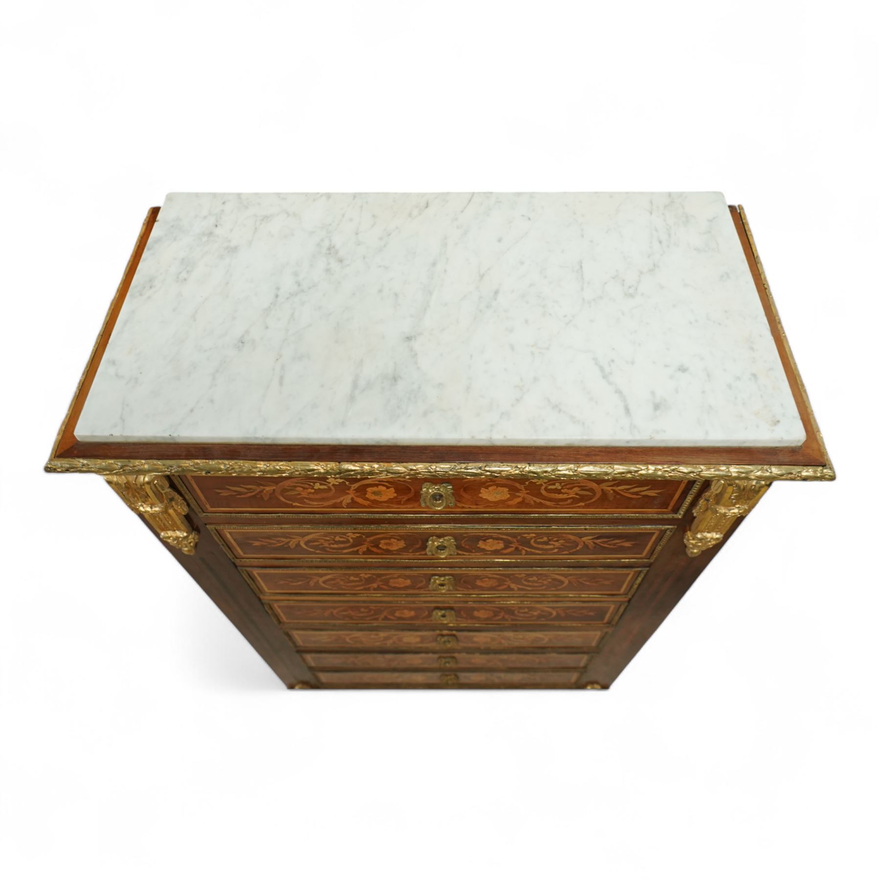 19th century French marquetry secrétaire à abattant in Louis XVI style, with rectangular marble top above a floral inlaid fall front enclosing fitted interior with arcaded pigeonholes, inlaid drawers and writing surface, gilt metal mounts and borders throughout, raised on cast ormolu feet