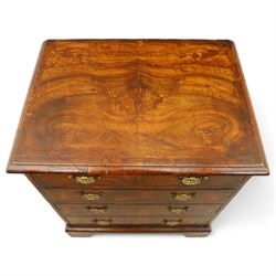 Small 19th century figured walnut chest of drawers, rectangular top with moulded edge over four graduating drawers with brass batwing handles, raised on bracket feet