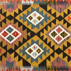 Afghan Maimana flatweave kilim runner, central field features large bold nested diamond motifs and stylized geometric lozenge patterns on olive purple, blue, and green tone ground, border stripe in orange ground, and fringe