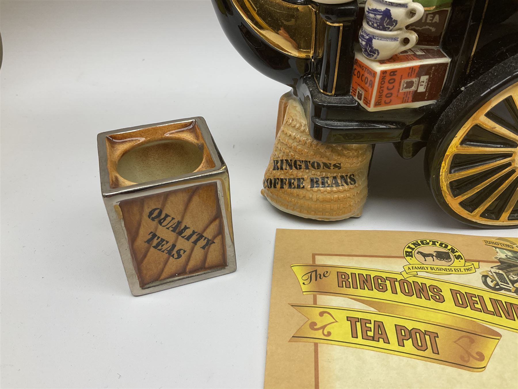 Ringtons novelty teapots, comprising the Ringtons Delivery Van teapot, and the Tea Merchant teapot, both with boxes and certificates of ownership.