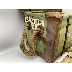 WW2 British Army RAMC 'Regimental Medical Pannier', well marked externally and dated 1941, stamped May 1943 internally, canvas covered wicker form with leather edges, hinged top and fall front with two rope carrying handles, fitted iron locking straps with securing chains; contains various unused field dressings and bandages with WW2 dates and two pillows; original label under lid L79cm