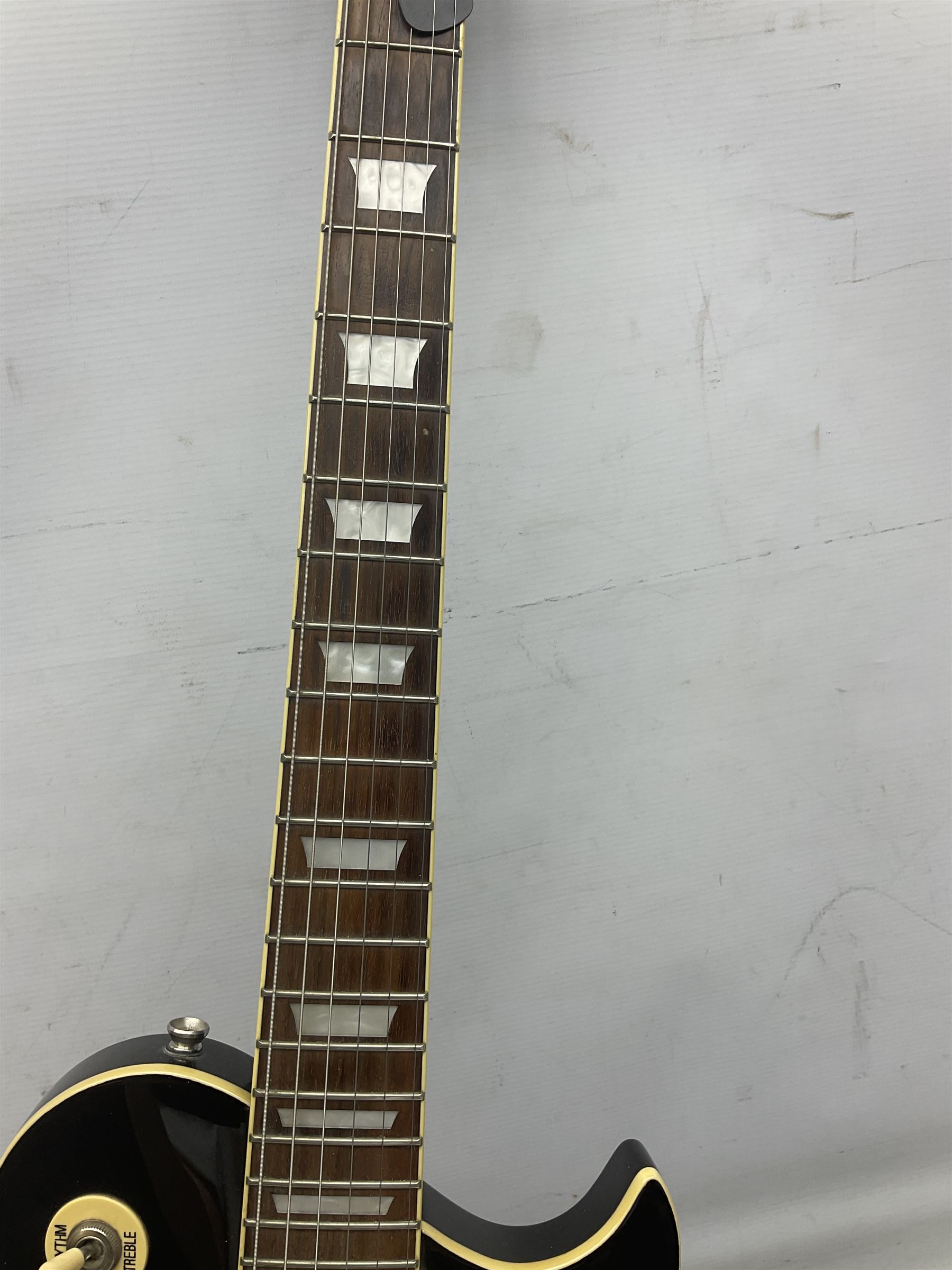 Aria Les Paul style electric guitar, no.037704CH L102cm; with amplifier, soft carrying case and stand; together with various guitar songbooks etc