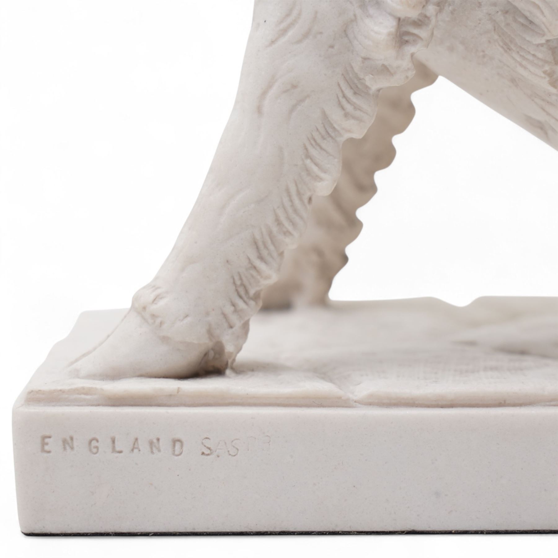 Modern sculpture of a boar, the base inset with an 'Arts and Commerce Promoted' medallion and marked 'England' on rectangular base H22cm