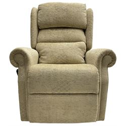 Electric riser reclining armchair, upholstered in cream fabric with repeating geometric pattern 