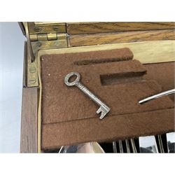 Twelve place setting canteen of cutlery by Lee & Wigfull Ltd, cased in an oak  chest, with key, meat carvers are missing, H18cm, L44cm 