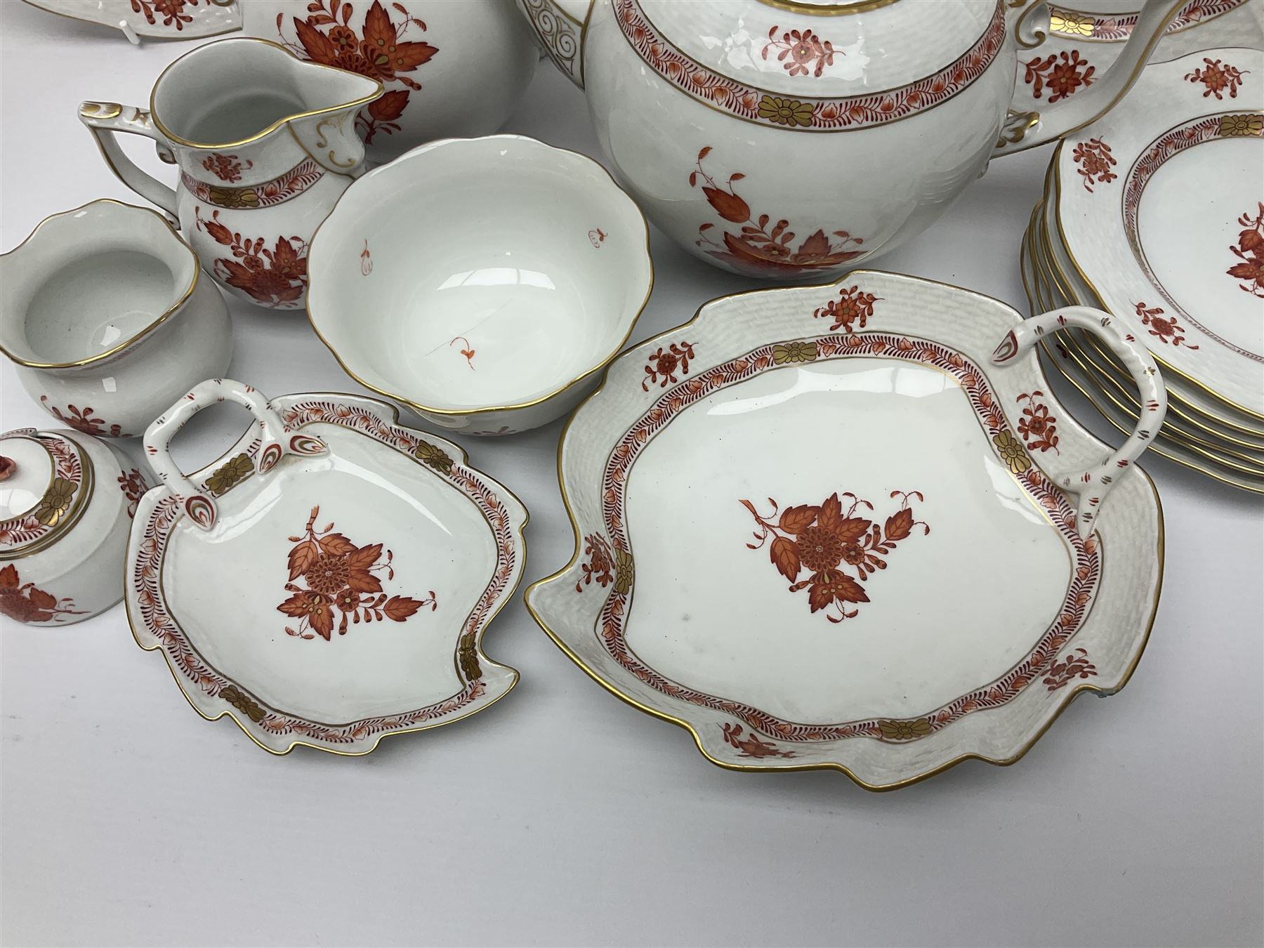 Herend Chinese Bouquet Rose pattern tea service comprising teapot, coffee pot, open sucrier, six cups and saucers, six tea plates, cream jug and stand, milk jug, two teabag holders, preserve pot, two leaf shaped dishes, four egg cups, salt & pepper pots, pair side plates and another plate