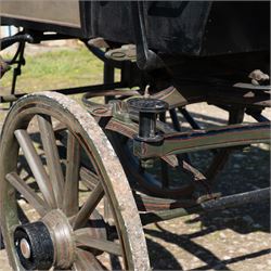 The Zetland Body Break by Peters & Sons, London

A fine and substantial late nineteenth century body break by Peters & Sons of London, circa 1880, formerly owned by the Marquis of Zetland. The carriage is finished in dark olive green and black with red, black and yellow lining, and is fitted with an elevated coachman’s box seat above a forward luggage compartment. The open rear body is entered by side doors and arranged with opposing longitudinal passenger seating.

The carriage is mounted on English pattern wooden artillery wheels with iron tyres and is carried on full elliptic springs, with a transverse helper spring behind. The front axle is fitted with fifth wheel turntable steering. The rear passenger compartment has upholstered longitudinal side benches beneath padded back rails, with turned spindle upper panels to the side doors and rear handrails. The driver’s seat is upholstered in corded fabric and secured with leather retaining straps.

Details include shaped splinter bar and turntable, folding rear step below the door with leather covered interior handle, luggage rails to either side, pole fittings for use with a pair or team of horses, and a handbrake with brake blocks operating to both rear wheels. The wheel hubs are fitted with polished hub caps engraved “Peters & Sons, London”. The exterior retains small Zetland family crests to the side panels.

The carriage has been conserved by Woods of Fairbourne Carriages Ltd and is recorded as Lot 146 in The George Shaw Collection sale, 5 November 2003, where it was catalogued as The Zetland Body Break and described as having previously been owned by the Marquis of Zetland.

Features
• Peters & Sons, London coachbuilder’s hub caps
• Known as The Zetland Body Break
• Formerly owned by the Marquis of Zetland
• Circa 1880
• Conserved by Woods of Fairbourne Carriages
• Dark olive green and black bodywork with red, black and yellow lining
• Elevated coachman’s box seat
• Forward luggage compartment
• Open rear passenger body with side doors
• Opposing longitudinal passenger seating
• Turned spindle upper panels to the side doors
• Folding rear step with leather covered interior handle
• Full elliptic spring suspension with transverse helper spring behind
• Fifth wheel turntable steering
• Handbrake with brake blocks operating to both rear wheels
• Wooden artillery pattern wheels with iron tyres
• Shaped splinter bar and pole fittings for a pair or team of horses
• Small Zetland family crests to the side panels

Provenance
The George Shaw Collection, 5 November 2003, Lot 146. Previously owned by the Marquis of Zetland.

Conservation

Conserved by Woods of Fairbourne Carriages.

Dimensions:
Overall length: 310 cm
Width: 176 cm
Height: 226 cm

Front wheel diameter: 98 cm
Rear wheel diameter: 140 cm

Seating:
Driver's box seat: 2 persons

Rear passenger compartment: Two longitudinal benches accommodating approximately 8 to 10 passengers