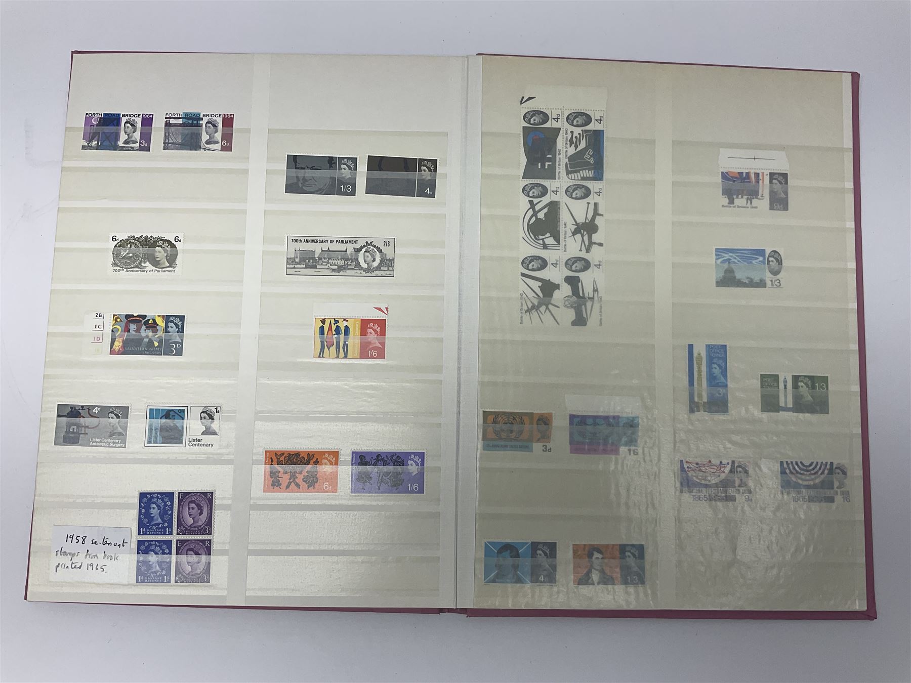Mostly Great British stamps, including King Edward VII two shillings and sixpence, five shillings and ten shillings, King George V seahorses, King George VI high values, Queen Elizabeth II pre and post decimal etc, housed in a pink stockbook 
