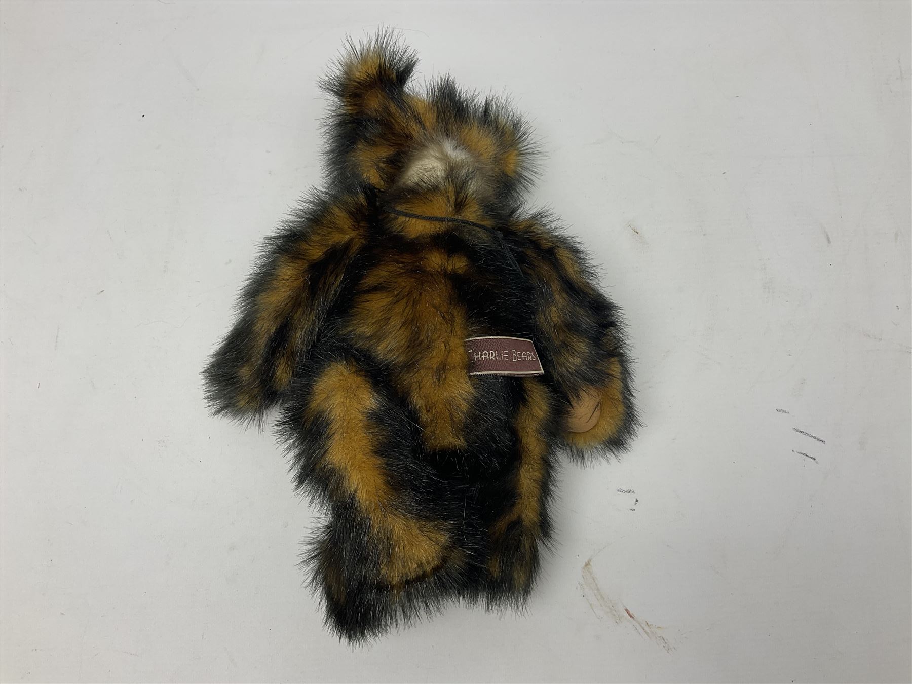 Seven Charlie Bears, comprising limited edition Anniversary Cheesecake SJ5471, designed by Isabelle lee, 431/500, Nuala CB185169, Liddy CB161648A, Philomena CB151592, and AJ CB171784B, each designed by Isabelle Lee, plus Shenanigans CB205243O, and another example lacking tag 