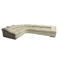 Natuzzi - 'Wave' corner sofa, upholstered in cream leather, in three sections with adjustable back rests 